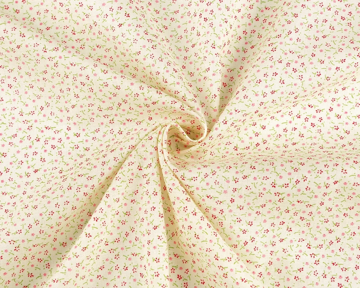 Drobné květinky na žlutém podkladu