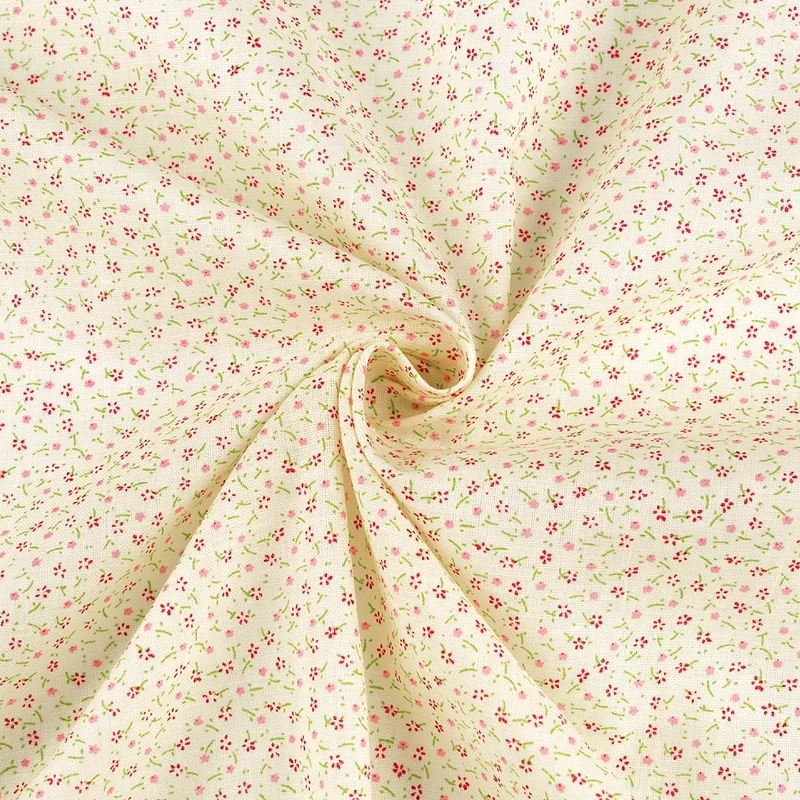 Drobné květinky na žlutém podkladu