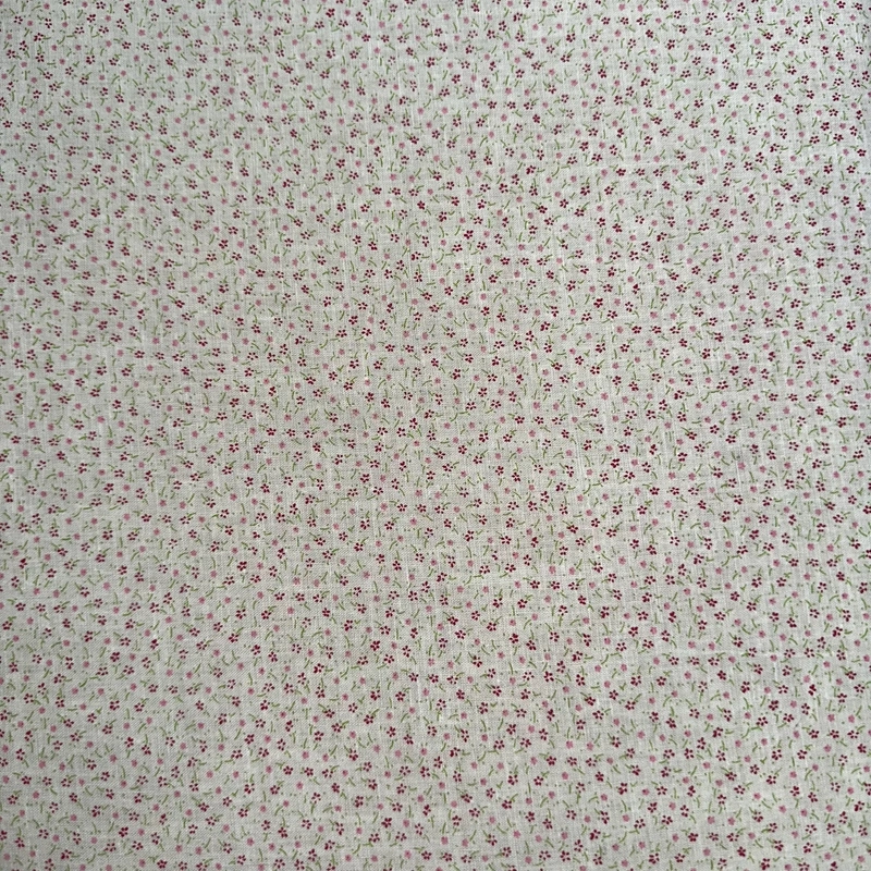 Drobné květinky na žlutém podkladu