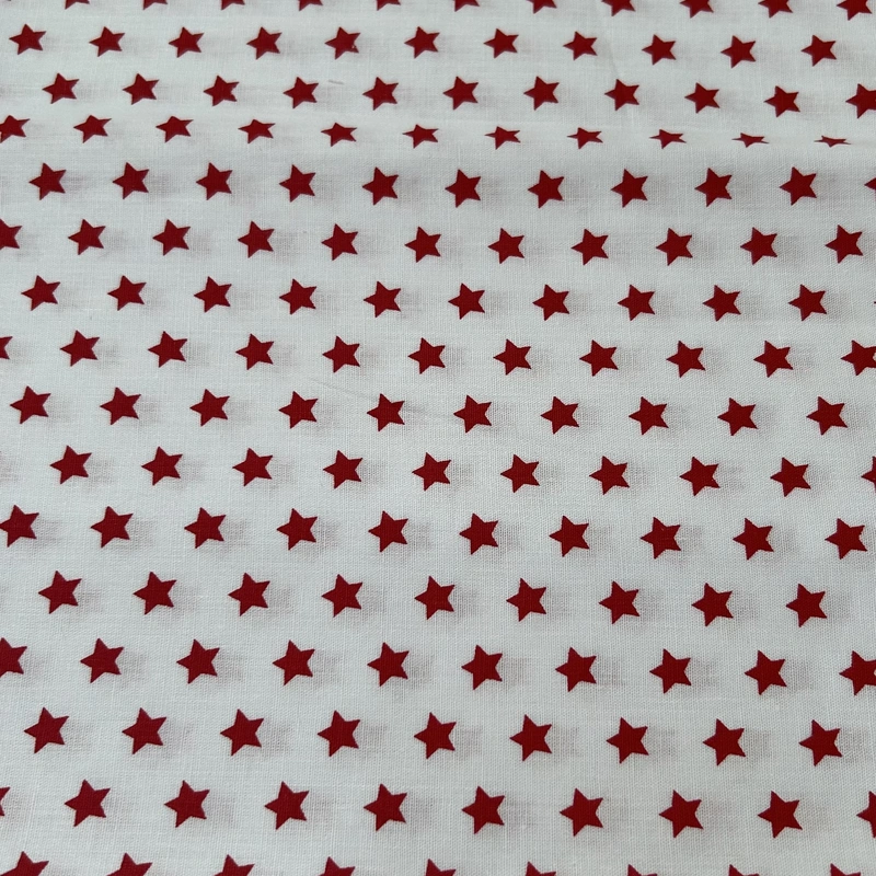 Bílá s červenými hvězdičkami